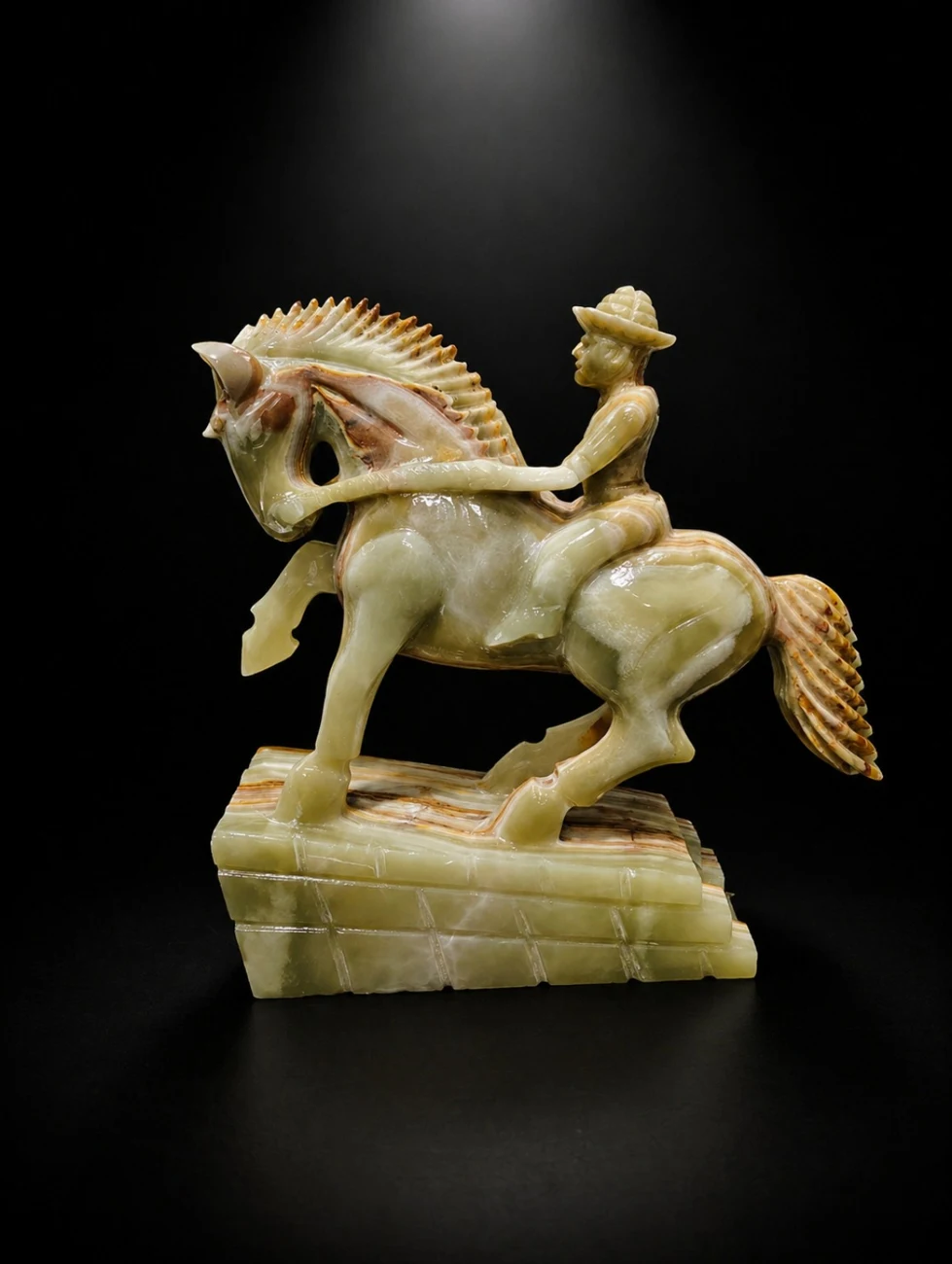 Horse and rider sculpture